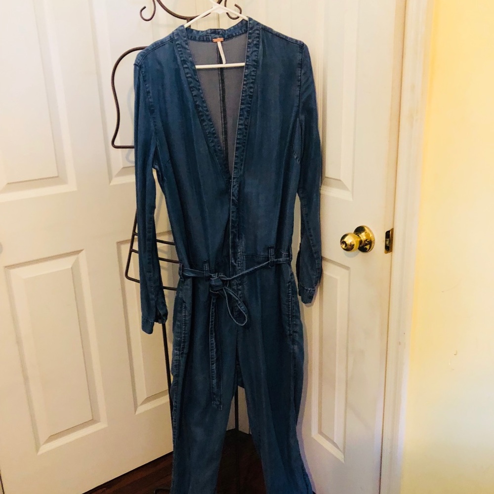 Free people denim jumpsuit size 8. Never worn